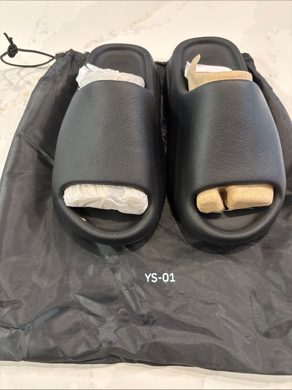 Yeezy Black Slide Sandals with Beige and White Inserts